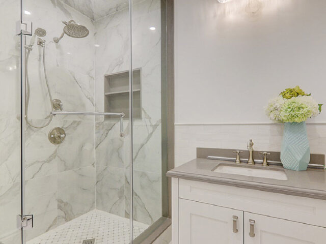 amazing basement bathroom with walk in shower and small vanity custom home by Torino construction