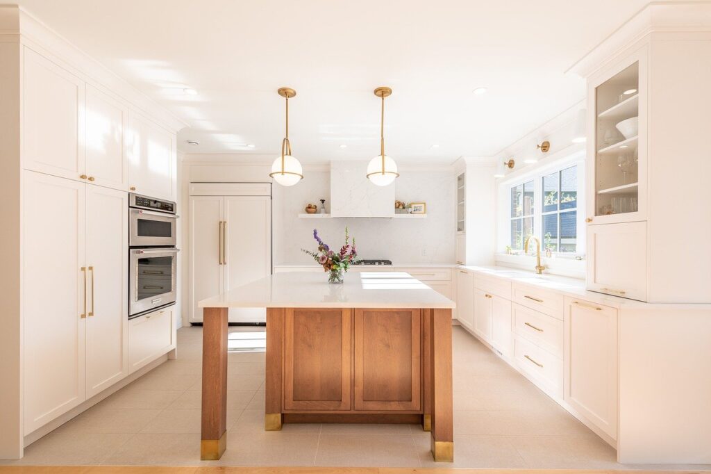 white kitchen with wooden table